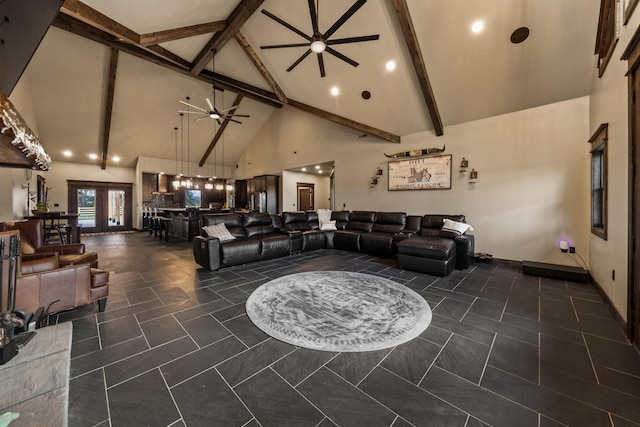 living room with beamed ceiling, ceiling fan, high vaulted ceiling, and french doors