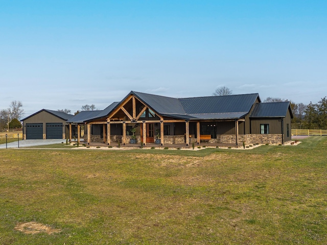 view of front facade featuring a garage and a front lawn