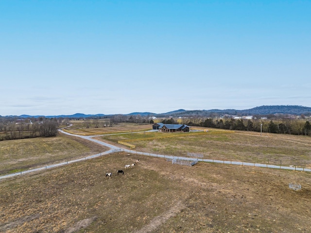 aerial view with a mountain view and a rural view