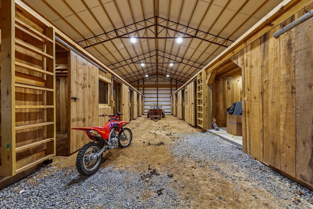 miscellaneous room featuring lofted ceiling