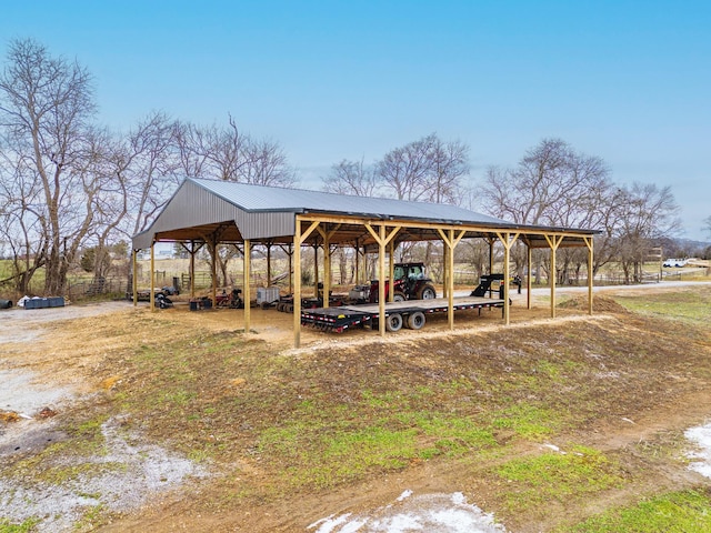 exterior space with a carport