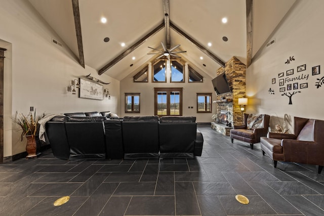 living room featuring beam ceiling, a fireplace, high vaulted ceiling, and ceiling fan