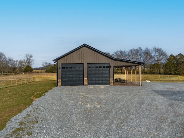 garage with a rural view