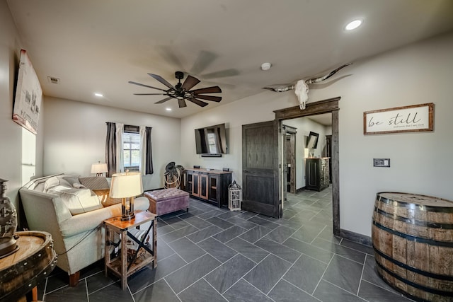 living room featuring ceiling fan