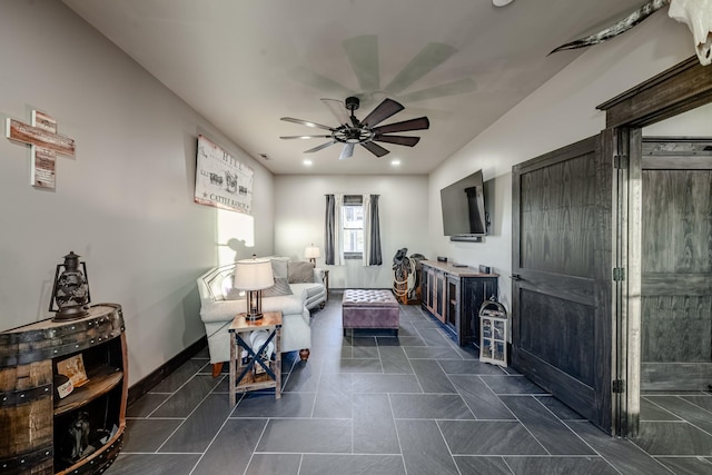 living room with ceiling fan