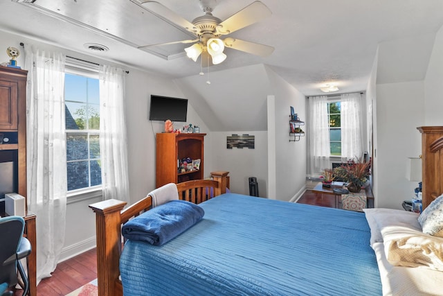 bedroom with lofted ceiling, wood-type flooring, and ceiling fan