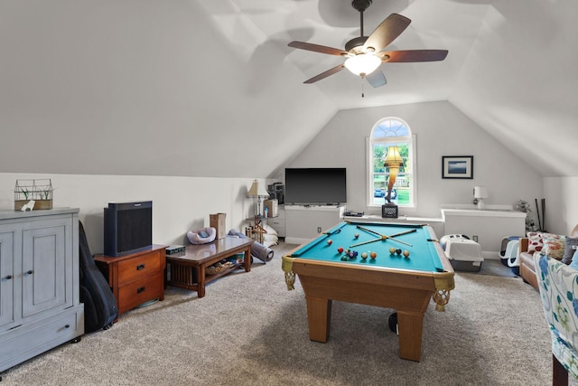 recreation room featuring ceiling fan, vaulted ceiling, and carpet