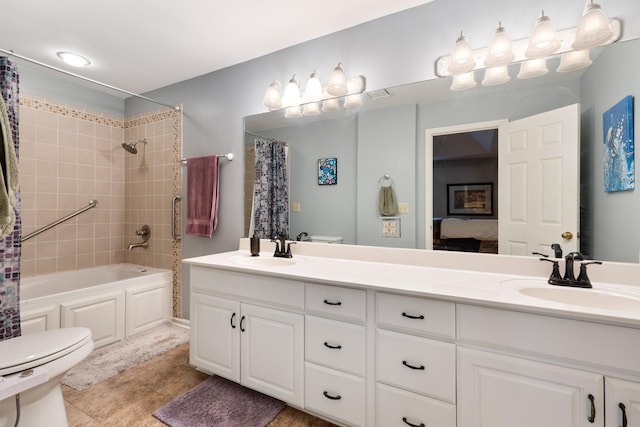 full bathroom featuring shower / bath combination with curtain, vanity, toilet, and tile patterned flooring