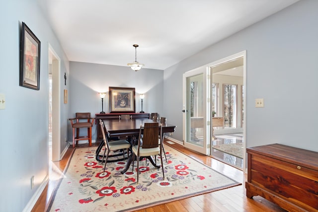 dining space featuring light hardwood / wood-style flooring