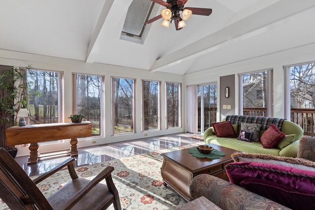 sunroom with lofted ceiling with beams and ceiling fan