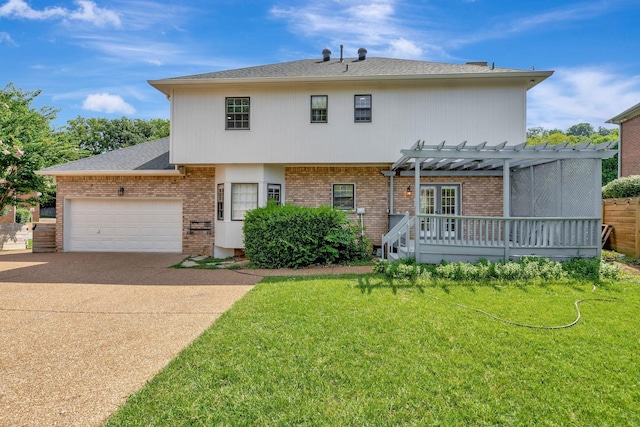 view of front facade featuring a garage, a front yard, and a pergola