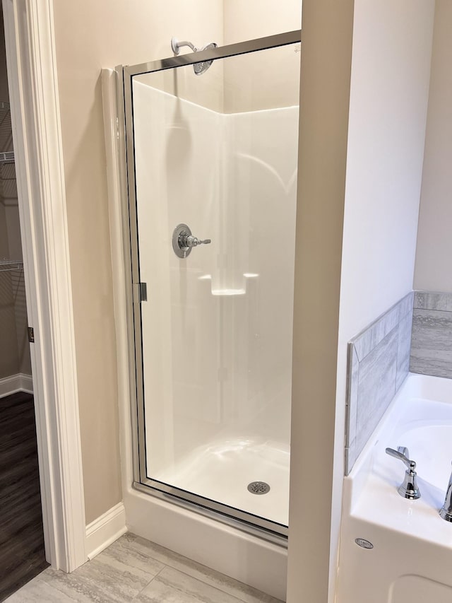 bathroom with independent shower and bath