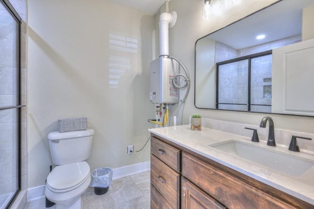 bathroom featuring vanity, a shower with door, and toilet