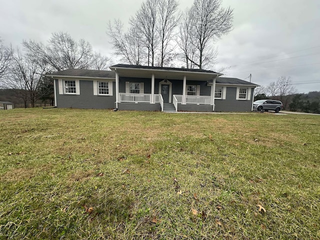 view of front of property with a front yard and a porch