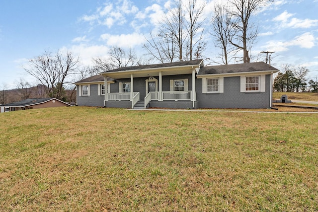 ranch-style home with covered porch and a front lawn