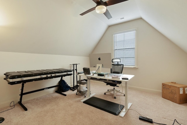 home office with ceiling fan, light colored carpet, and vaulted ceiling