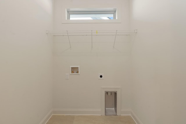 laundry area with hookup for an electric dryer and hookup for a washing machine