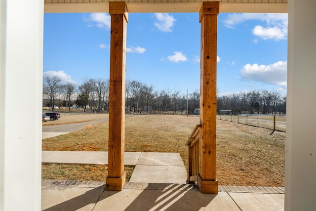 view of yard with a rural view