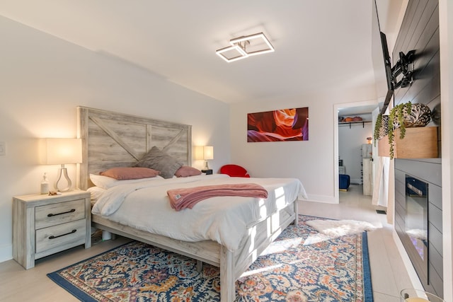 bedroom featuring light wood-type flooring