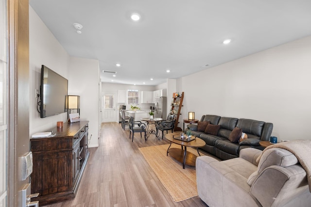 living room featuring light wood-type flooring