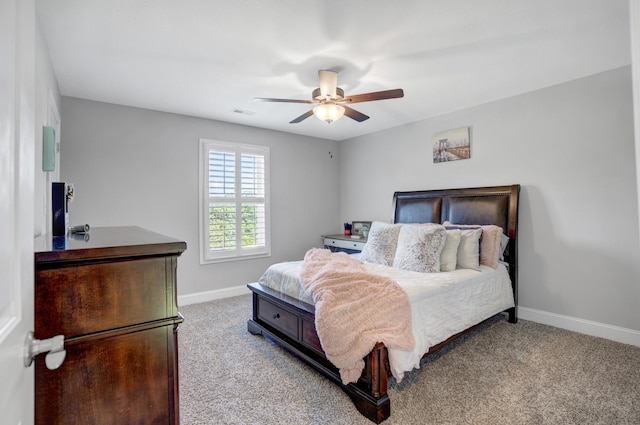 bedroom with light colored carpet and ceiling fan