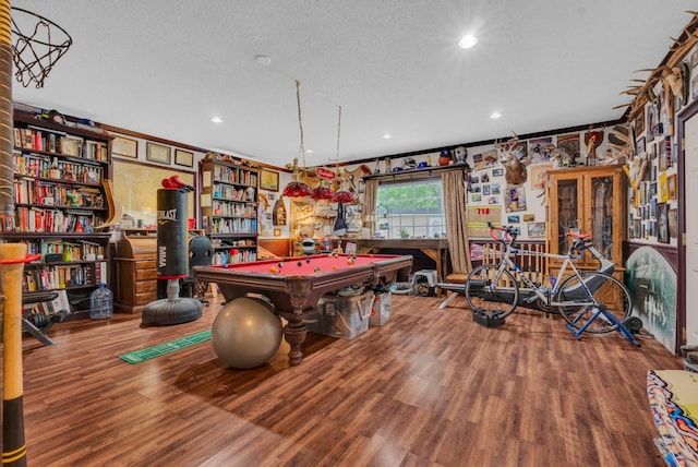 playroom with hardwood / wood-style floors, a textured ceiling, and billiards