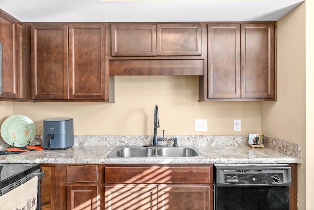 kitchen featuring sink, range with electric cooktop, and black dishwasher