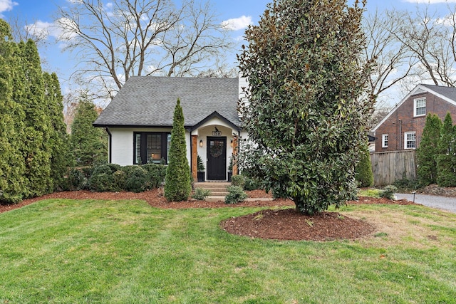 view of front of property with a front lawn