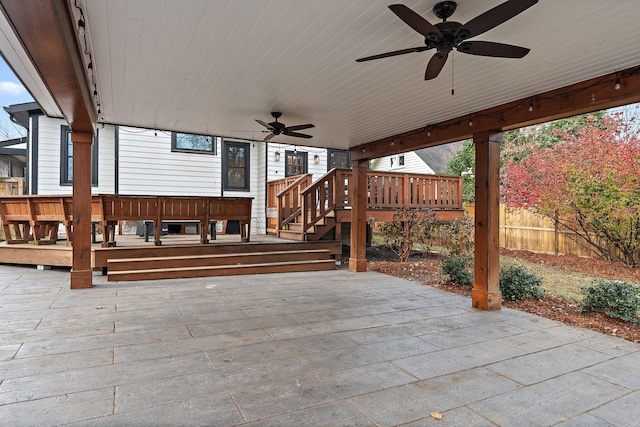 deck with a patio area and ceiling fan