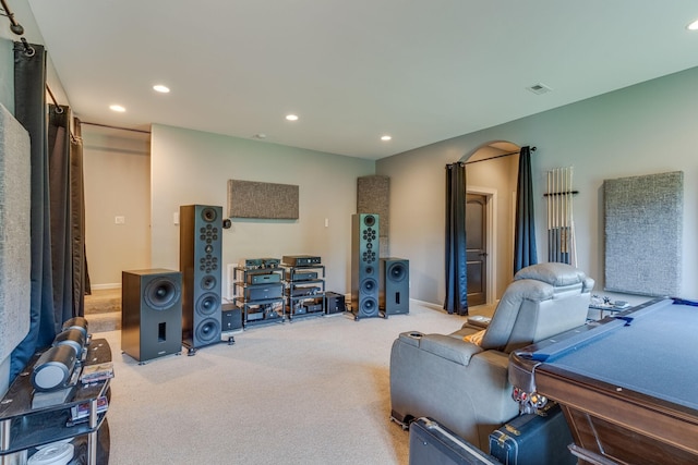 game room with light colored carpet