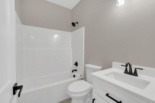 full bathroom with bathtub / shower combination, vanity, and toilet