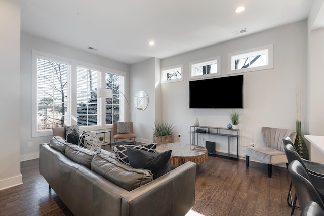 living room with dark hardwood / wood-style floors