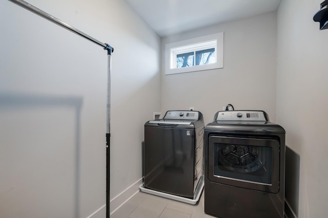 laundry area with washer and clothes dryer