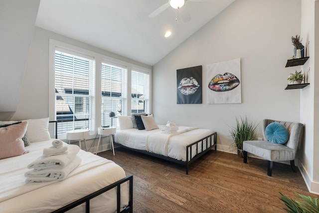 bedroom featuring ceiling fan, lofted ceiling, and dark hardwood / wood-style floors