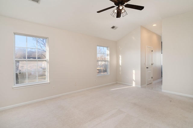 carpeted empty room featuring ceiling fan