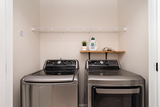 washroom featuring separate washer and dryer