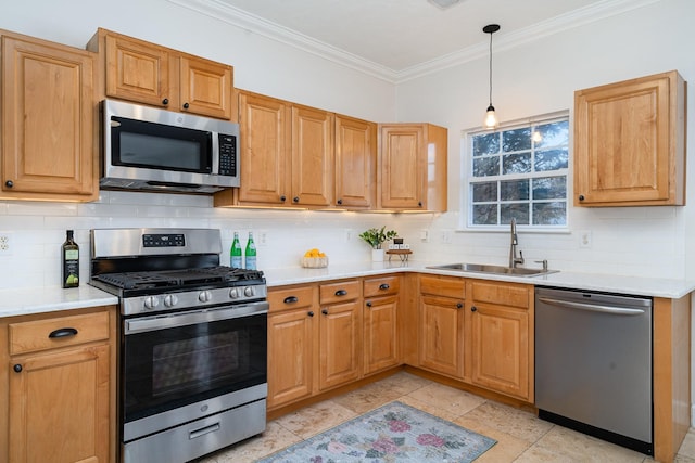 kitchen featuring tasteful backsplash, ornamental molding, appliances with stainless steel finishes, and sink