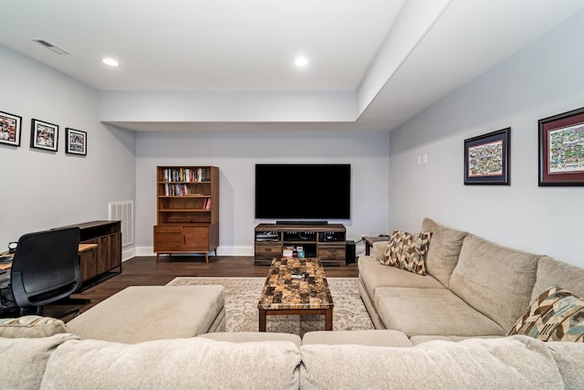 living room featuring dark hardwood / wood-style flooring