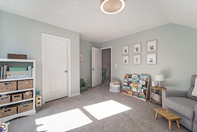 game room with light colored carpet and vaulted ceiling