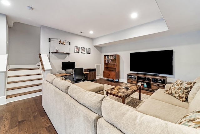 living room featuring dark hardwood / wood-style floors