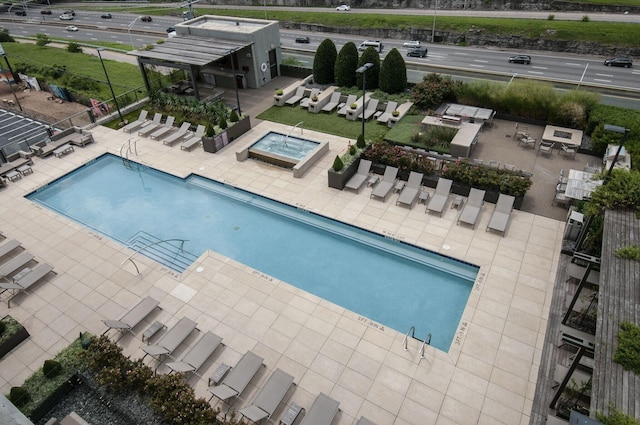 view of pool featuring a patio area