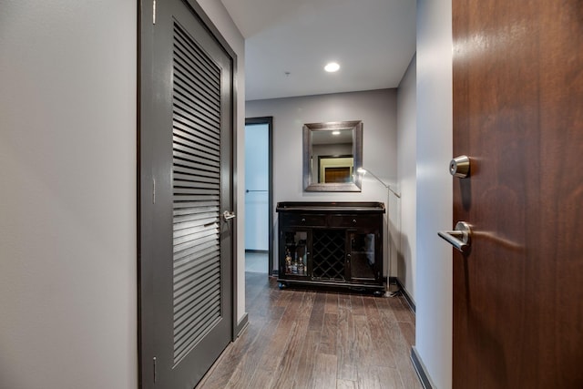 hall featuring dark wood-type flooring