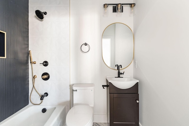 full bathroom with vanity, tiled shower / bath combo, and toilet