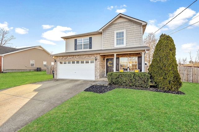 traditional-style house with brick siding, a garage, concrete driveway, and a front yard