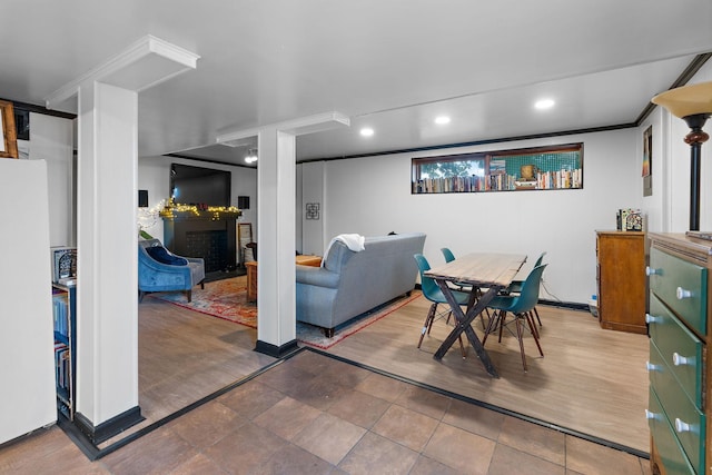 dining area featuring ornamental molding