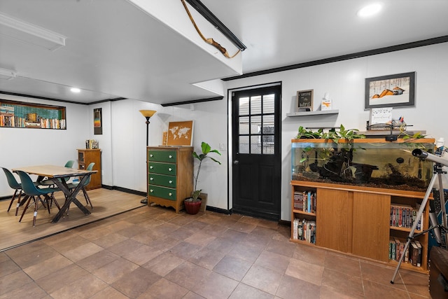 entryway featuring ornamental molding