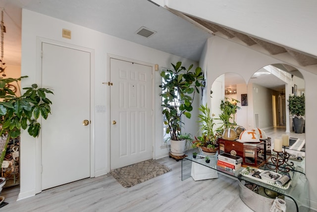 entrance foyer with light wood-type flooring