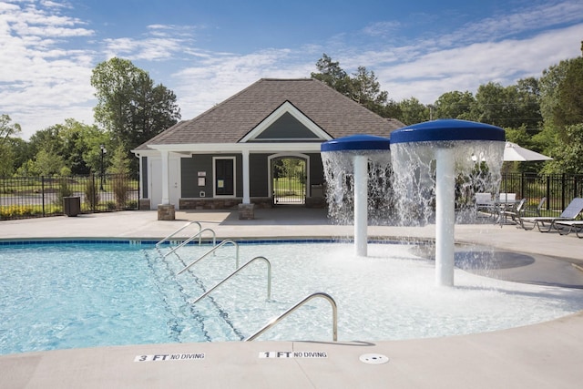 view of pool featuring a patio and pool water feature