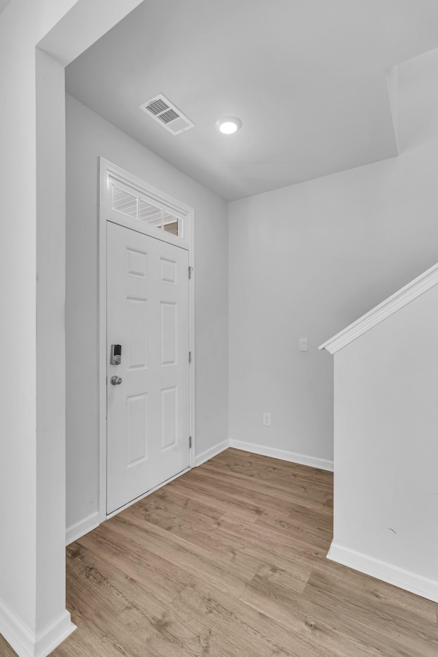 foyer entrance featuring light hardwood / wood-style flooring