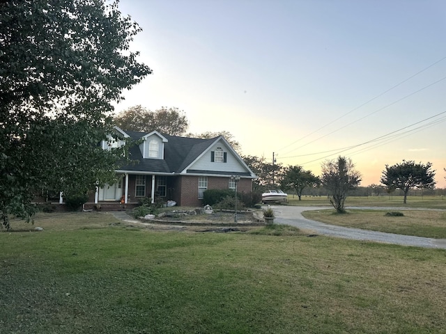 view of front of home featuring a yard